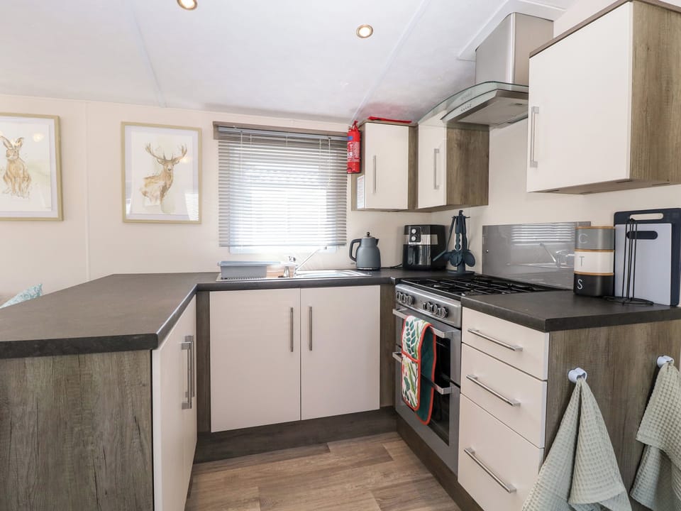 Fridge, electric kettle, toaster, cookware/dishes/utensils