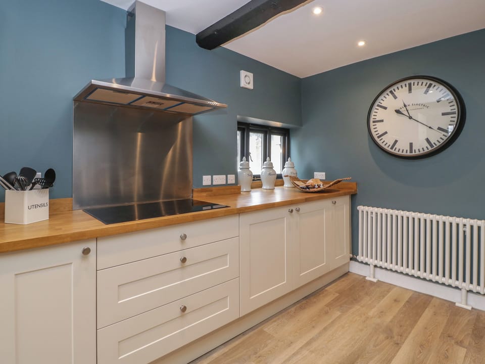 Fridge, electric kettle, toaster, cookware/dishes/utensils