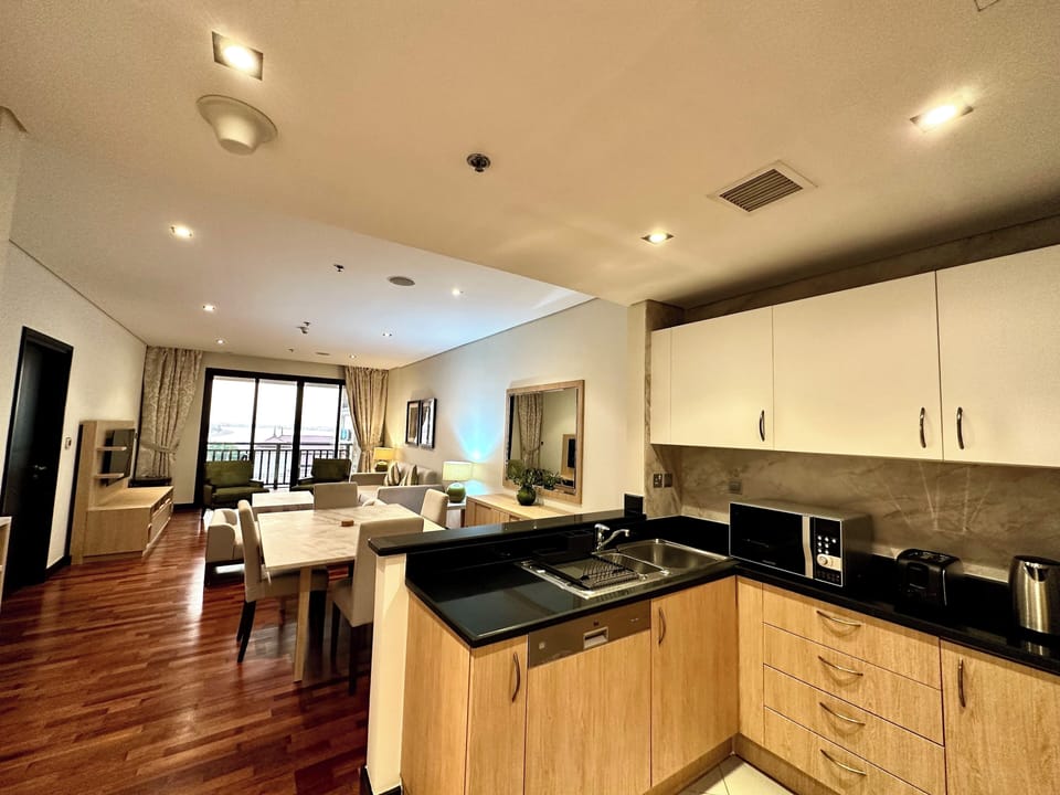 Panoramic Apartment | Private kitchen | Full-size fridge, microwave, oven, stovetop