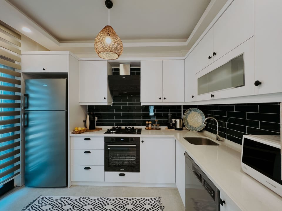 Exclusive Villa | Private kitchen | Fridge, dishwasher, cookware/dishes/utensils, paper towels
