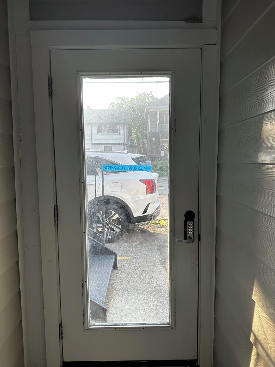 Door from breezeway to alley
