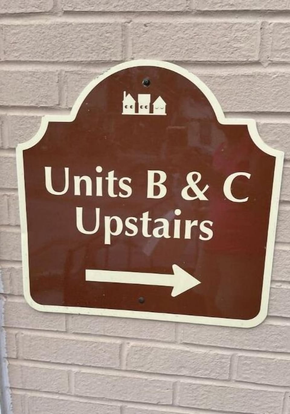Unit C is located at the top of the stairs. 