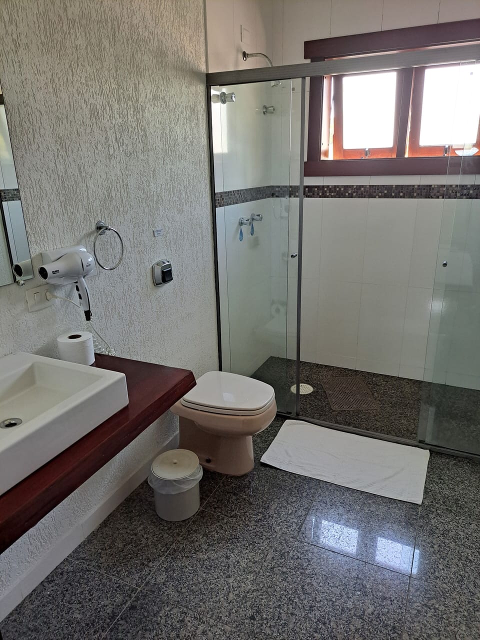 Standard Room | Bathroom | Hair dryer, towels, soap, toilet paper