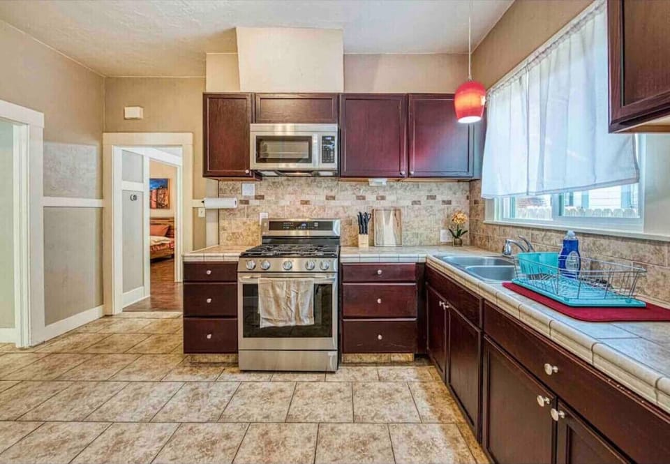 Bright kitchen with modern appliances and plenty of natural light.