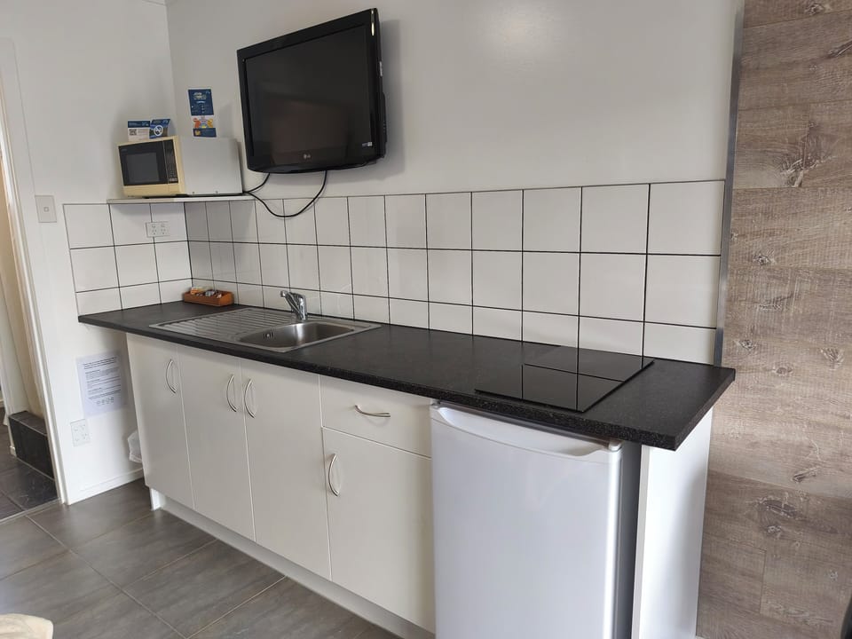 Studio Unit with Bunkroom | Private kitchen | Microwave, coffee/tea maker, electric kettle, toaster