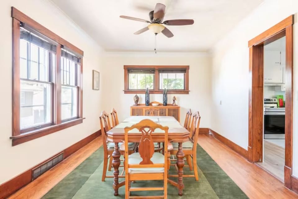 Dining room with seating for 6,  plus 8 folding chairs to extend the gathering.