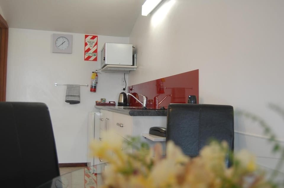 Two Bedroom Apartment | Private kitchen | Coffee/tea maker, fridge, microwave, electric kettle