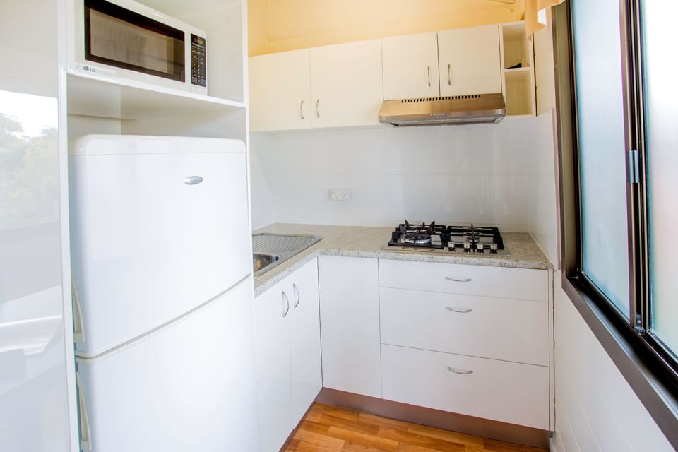 Standard One Bedroom Cabin - Pet Friendly | Private kitchen | Coffee/tea maker, microwave, stovetop, cookware/dishes/utensils