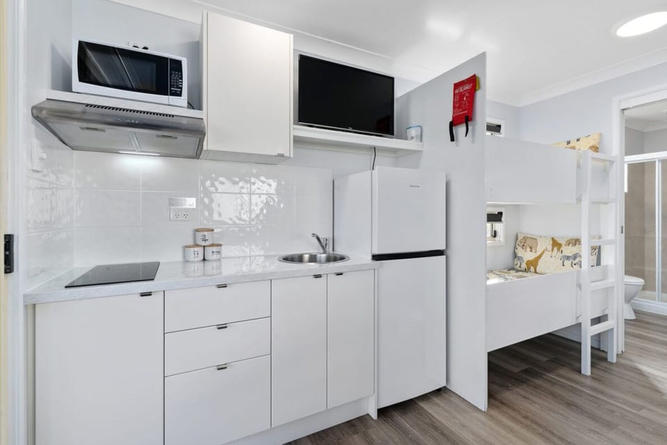 Standard One Bedroom Cabin | Private kitchen | Coffee/tea maker, microwave, stovetop, cookware/dishes/utensils