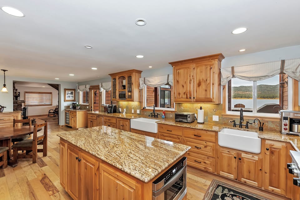 Kitchen features an island and modern appliances.