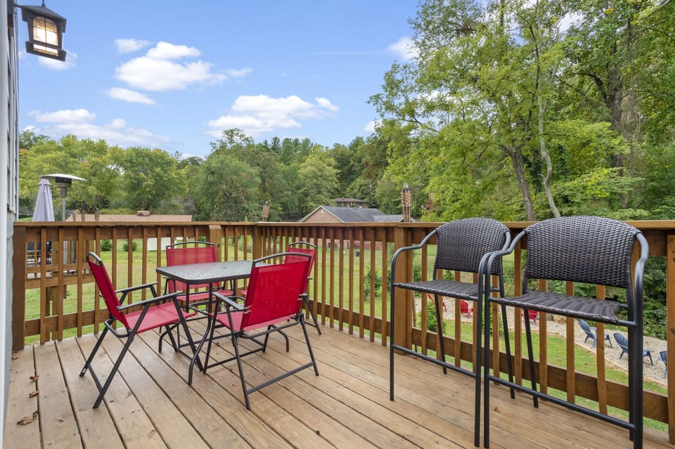 Private balcony with an al fresco dining area and BBQ grill.