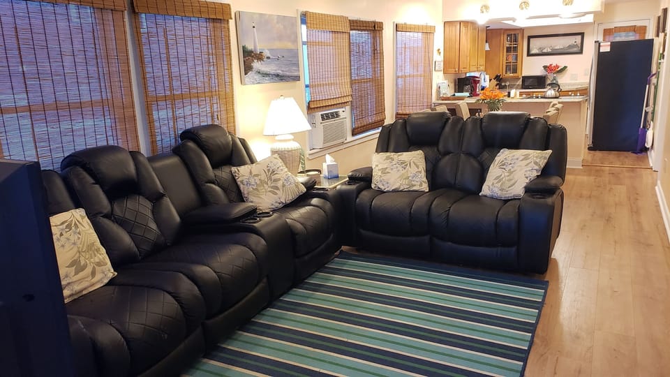 1st Floor:  Living Rm with comfy theater-style seating. The love seat reclines!