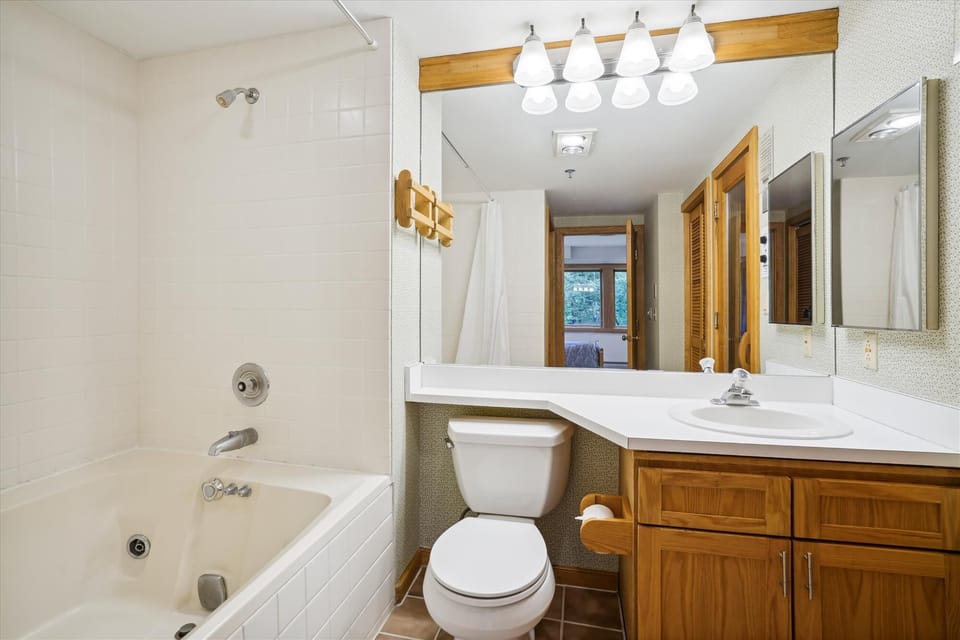 Additional Full Bathroom with Tub and Shower - Another full bath provides added convenience for groups and families staying together.