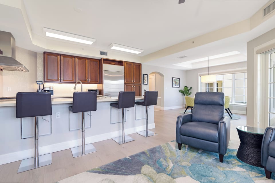 Gather around the spacious island for casual breakfasts or evening drinks.
