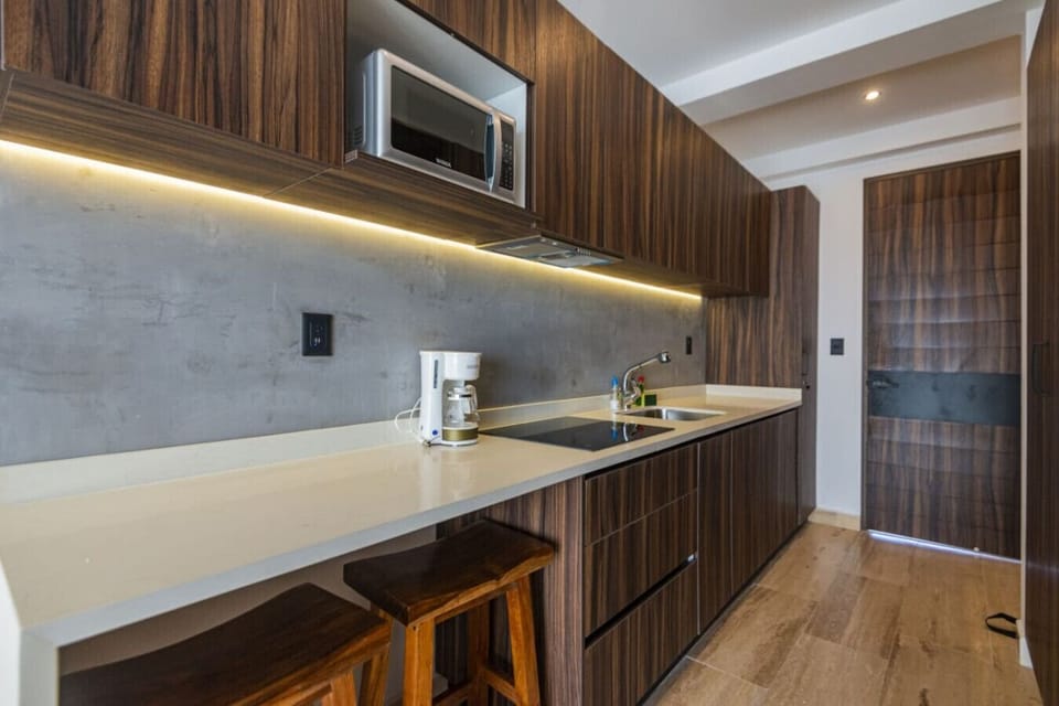 Cook in style: sleek amenities meet cozy charm in this kitchen.