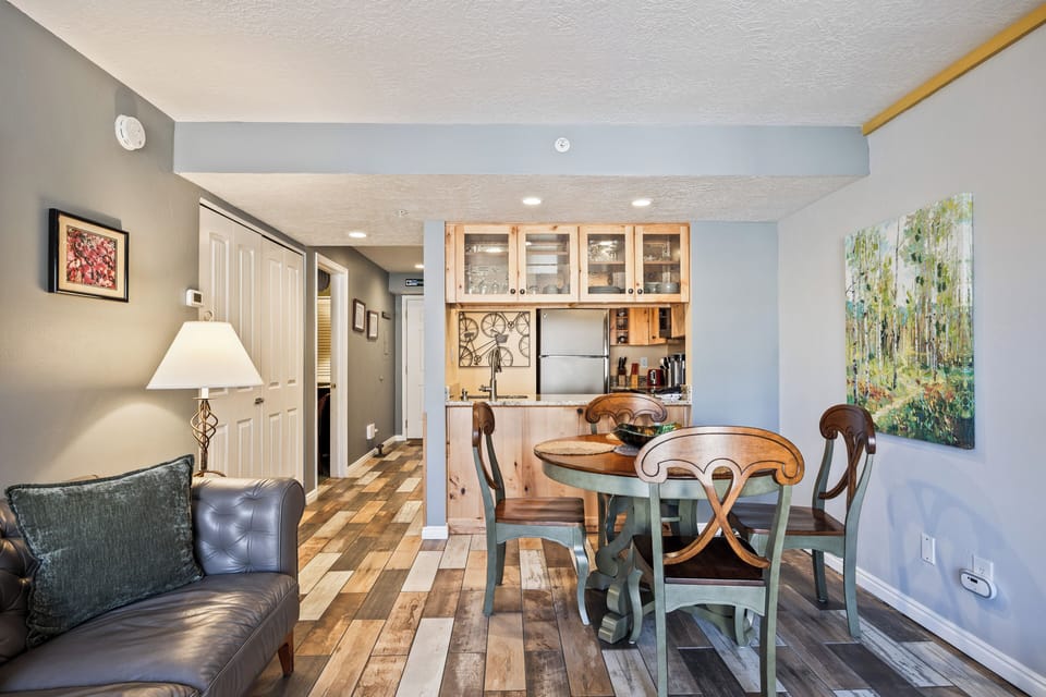 Open-concept layout connecting the living room and dining area, ideal for relaxing and entertaining.