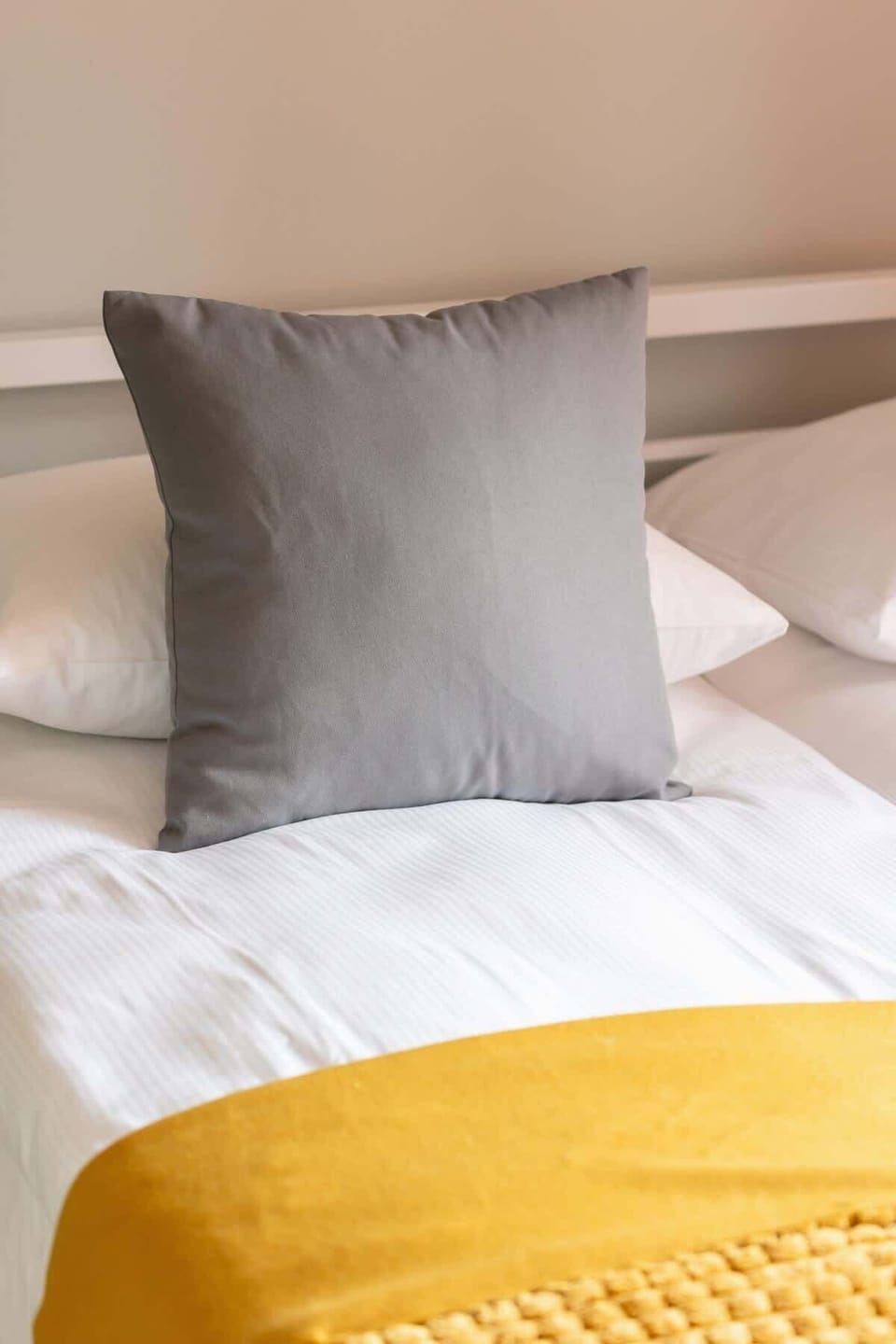 Another angle of the bedroom with a bright and clean layout, offering a relaxing retreat.

