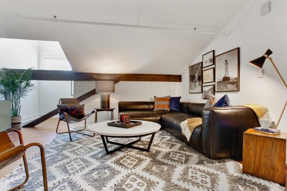 Open Concept Living Room | XL Flat Screen TV | Central Common Area