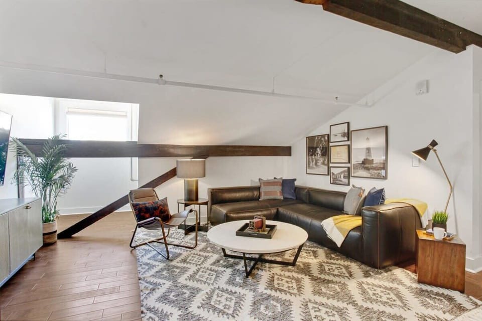 Open Concept Living Room | XL Flat Screen TV | Central Common Area