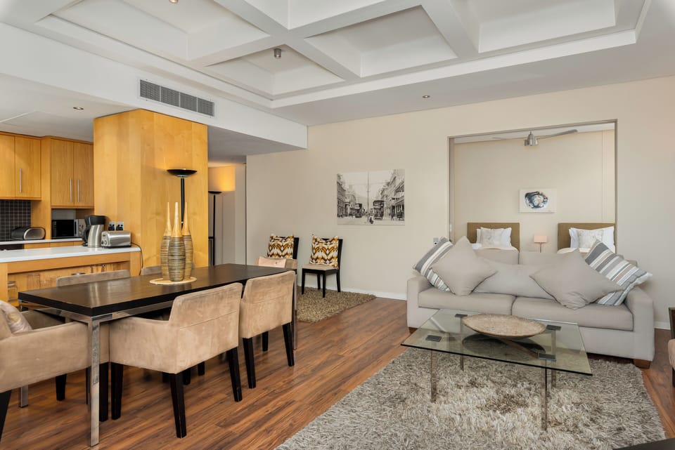 Grand Apartment | Living area | 50-inch flat-screen TV with cable channels, Netflix, streaming services