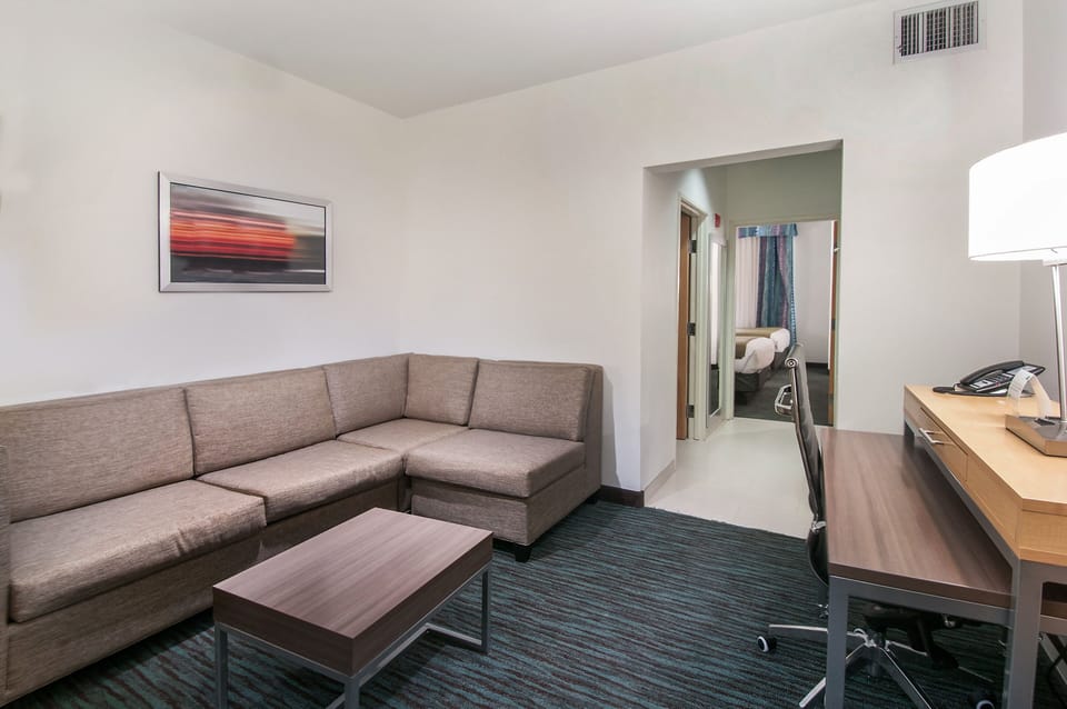 Suite, 1 Bedroom | Desk, iron/ironing board, free cribs/infant beds, free WiFi