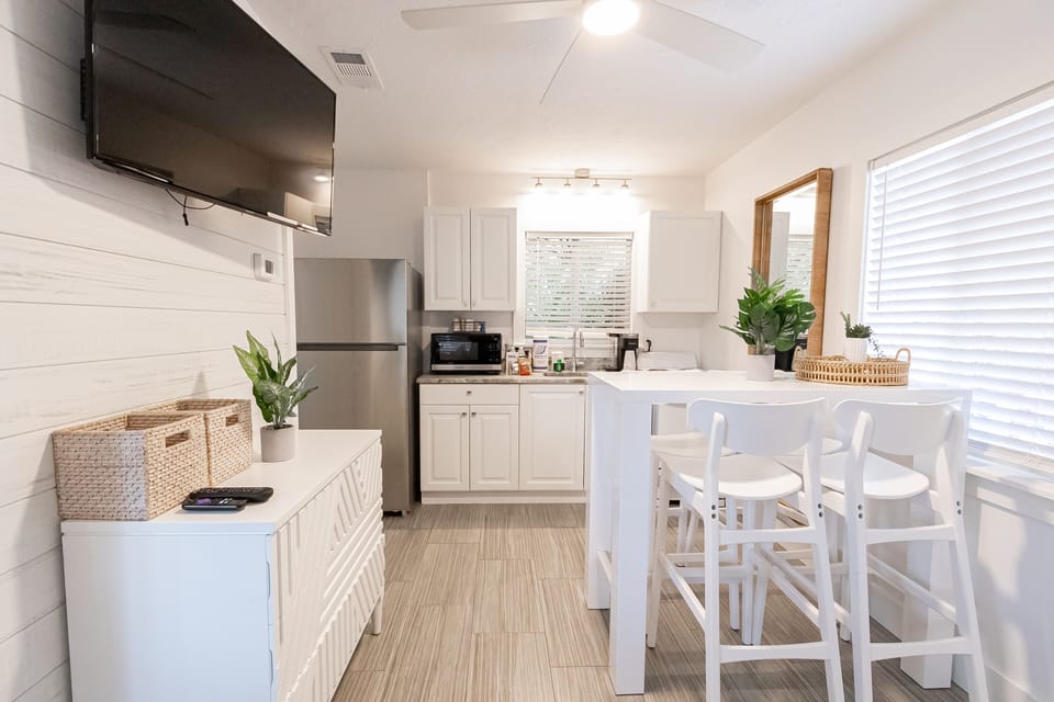 Luxury Suite, 1 Bedroom, Pool Access | Private kitchenette | Coffee/tea maker, toaster, cleaning supplies, paper towels