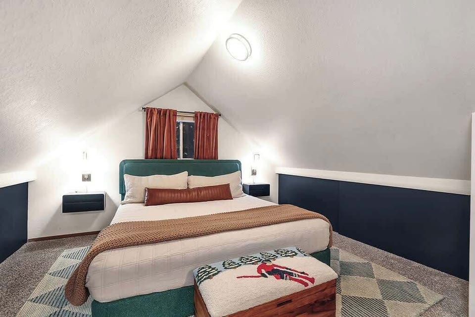 Enjoy the second master upstairs with a ultra-comfortable king bed with plenty of space.