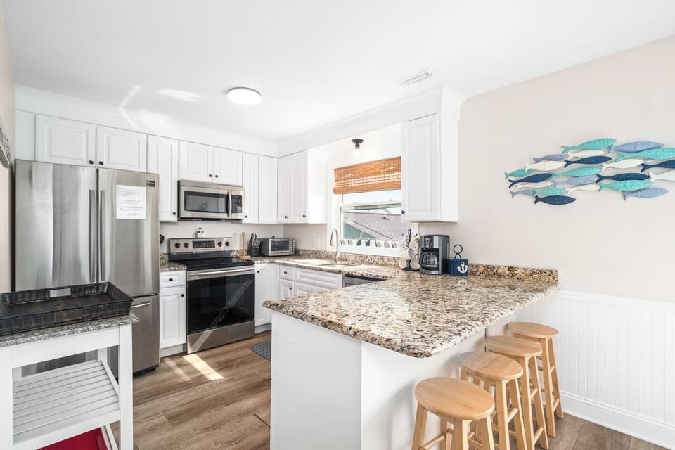 Bar seating for up to 4 at the kitchen