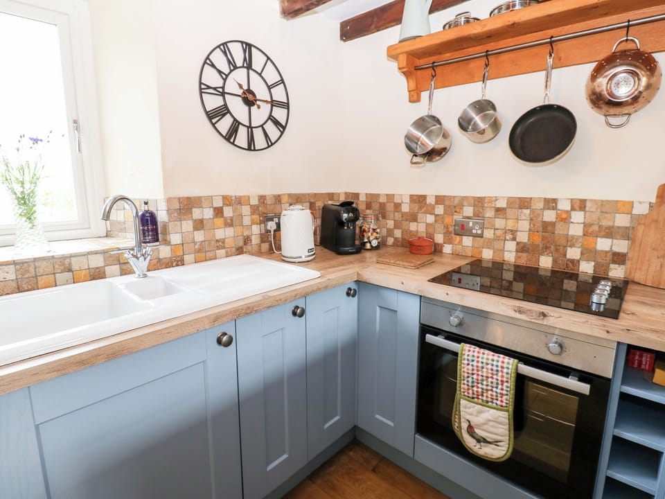 Fridge, electric kettle, toaster, cookware/dishes/utensils