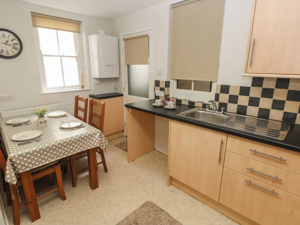 Fridge, electric kettle, toaster, cookware/dishes/utensils