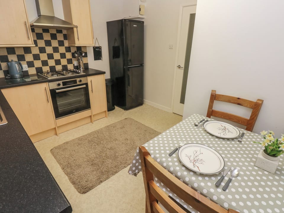 Fridge, electric kettle, toaster, cookware/dishes/utensils