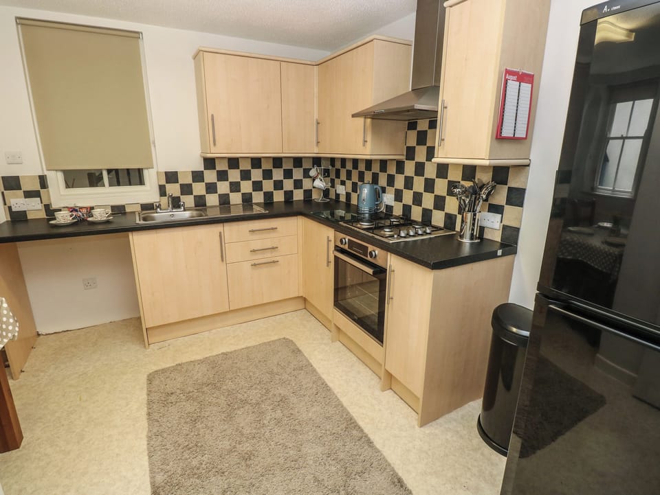 Fridge, electric kettle, toaster, cookware/dishes/utensils