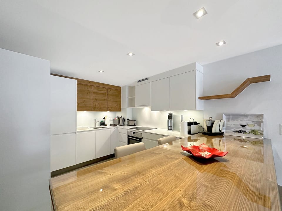 Modern fitted kitchen and dining table