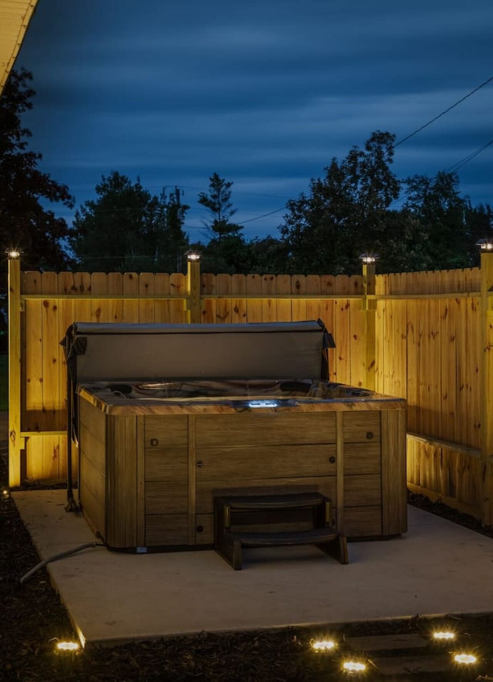 We make sure to keep the hot tub well illuminated for a relaxing soak under the stars.