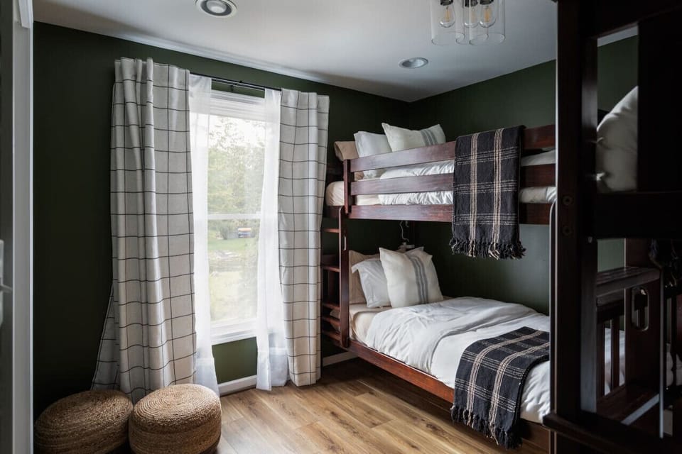 Cozy bunk beds, ideal for family stays, offering a fun and restful retreat.