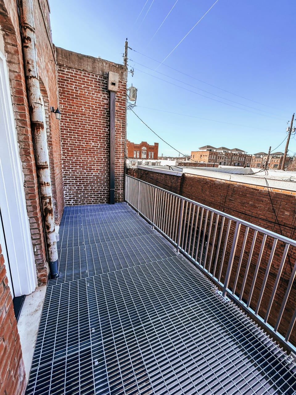 Relaxing balcony outside the primary bedroom.