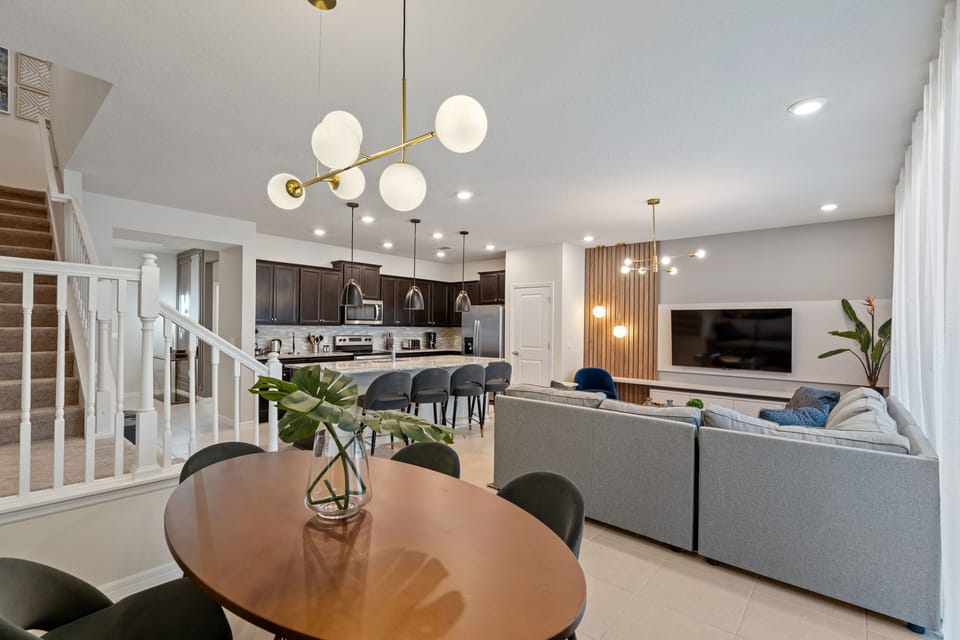 Open Concept Elegance: Dining, Living, and Kitchen in Perfect Harmony