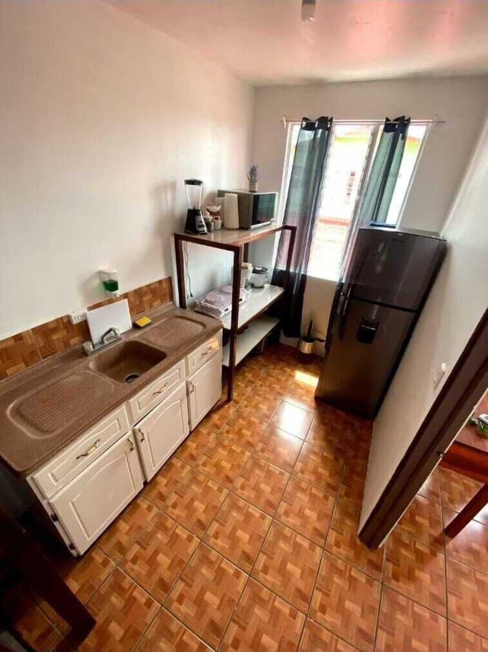 Basic Double Room | Private kitchen | Full-size fridge, microwave, coffee/tea maker, electric kettle