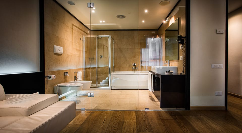 Studio Suite | Bathroom | Hair dryer, bidet, towels, soap