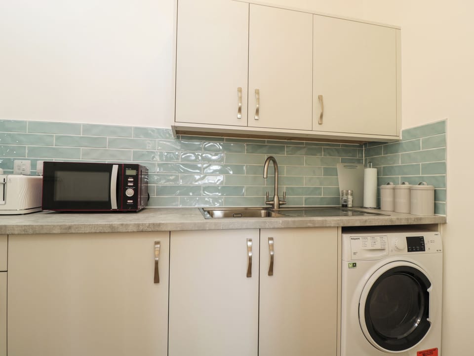 Fridge, electric kettle, toaster, cookware/dishes/utensils