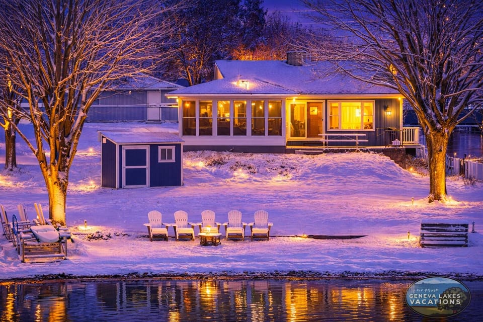 Lakeside view of the home in the winter