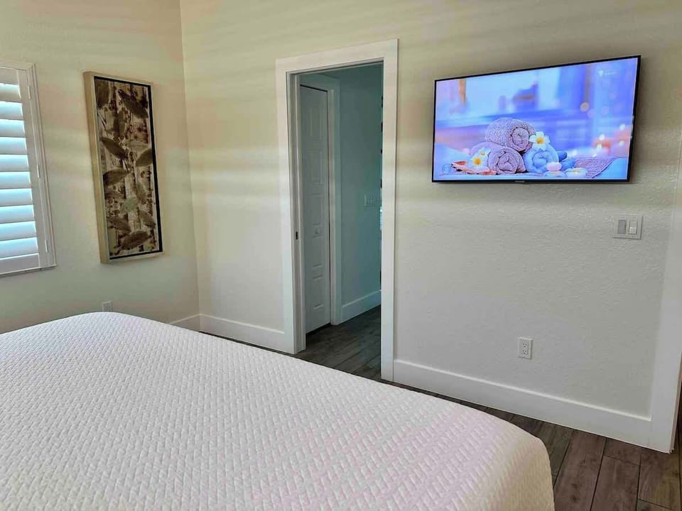 Master Bedroom and walk in closet with shelving/hangers
