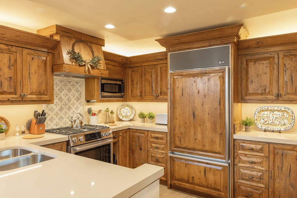 Fully equipped chef's kitchen with gas stove, and SubZero fridge with ice maker.