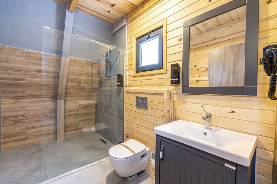 Bungalow, 3 Bedrooms | Bathroom | Shower, rainfall showerhead, hair dryer, bathrobes