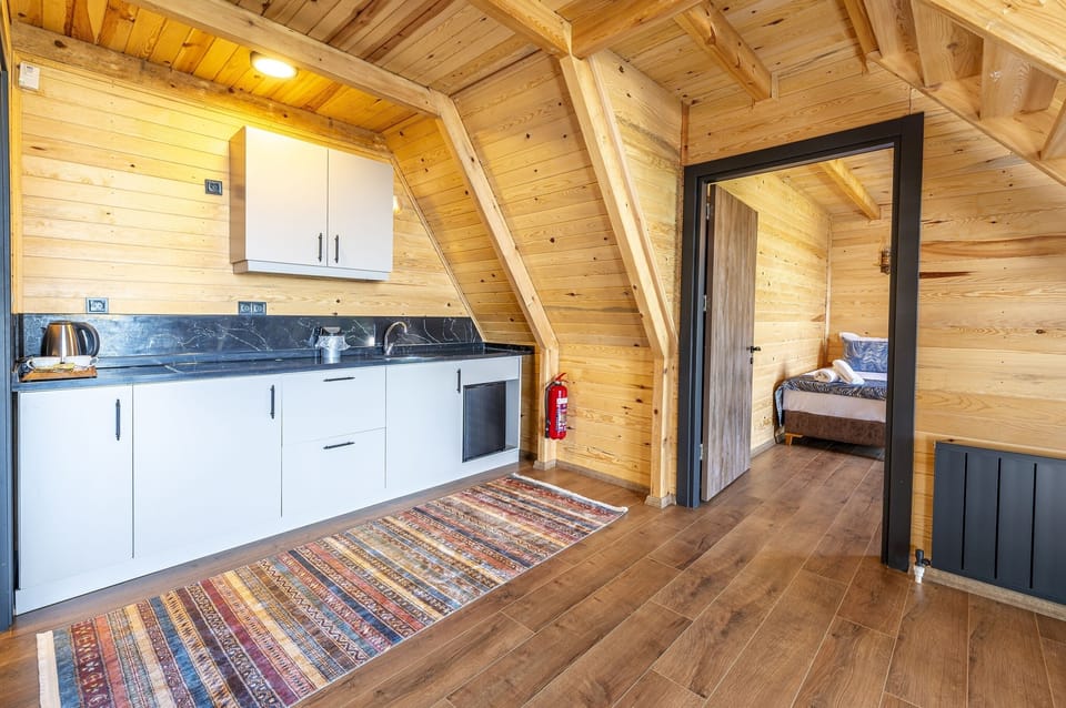 Bungalow, 3 Bedrooms | Private kitchen | Mini-fridge, electric kettle, eco-friendly cleaning products