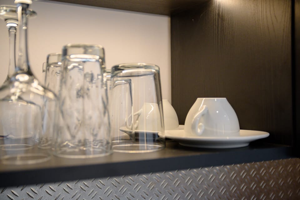 Espresso maker, mini-fridge, microwave, electric kettle