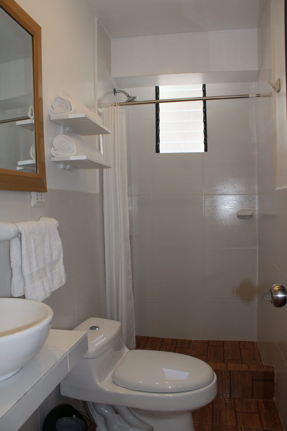 Shower, rainfall showerhead, towels