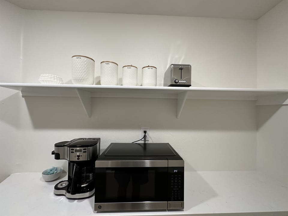 Pantry with microwave and coffee maker