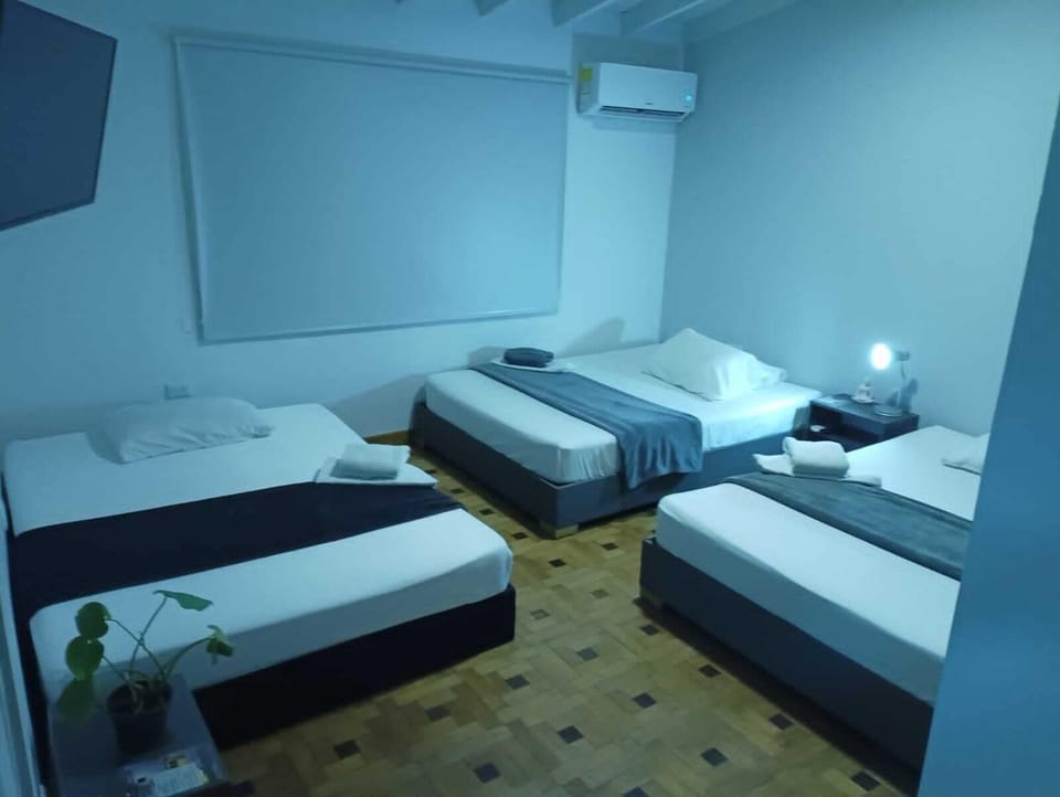 Family Room | Premium bedding, desk, free WiFi