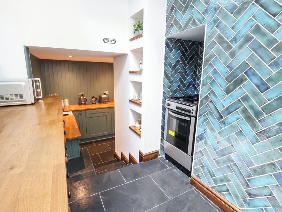 Fridge, electric kettle, toaster, cookware/dishes/utensils